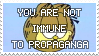 A stamp with Garfield. There is text infront of Garfield saying 'YOU ARE NOT IMMUNE TO PROPIGANDA'